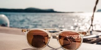 white framed brown lens sunglasses