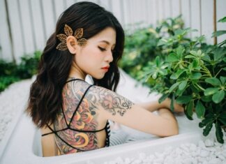 Cultural Connections: Navigating Dating with a Korean Girl in the United States women's orange and black floral back tattoo