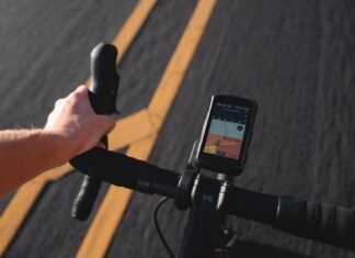 The Art of Cycling: A Journey of Wellness and Adventure a person riding a bike with a gps app on the handlebars