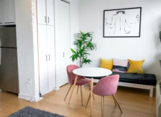 8 Ways to Make Your Airbnb Stand Out in a Competitive Market brown wooden chair near white wooden door