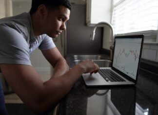 The Recent Updates of Wazamba Bonuses Prove to Be Successful in 2023 man in gray t-shirt using macbook pro