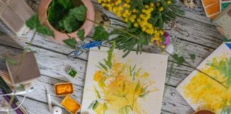 yellow flower on white paper