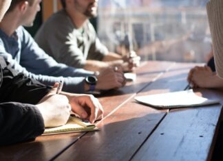 3 Training Resources to Get New Hires Up to Speed Fast people sitting on chair in front of table while holding pens during daytime