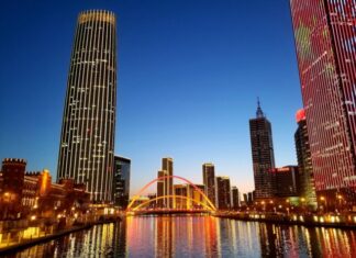 User Perception and the Success of the Digital Yuan lighted city skyline at dusk