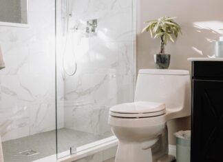 Why You Might Be Thinking About Bidets All Wrong white ceramic toilet bowl beside white ceramic toilet bowl