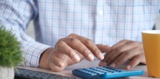 person using black computer keyboard