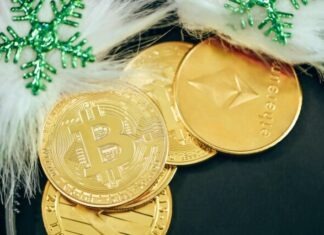 Adopting Decentralized Stability: A Primer on the bitCNY (BITCNY) Stablecoin a pile of gold bitcoins sitting on top of a table