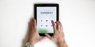 person using black iPad