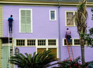 Do Painters Need General Liability Insurance? Read Complete Guide two men in ladder on wall