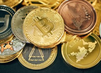 Crypto Insurance: Safeguarding Digital Assets in a Risky World a pile of gold and silver bitcoins