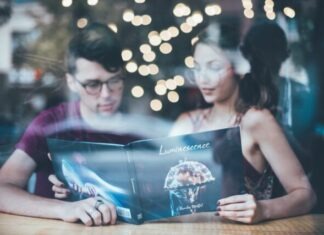The Beauty of Confidence: How Self-Esteem Enhances Your Online Dating Experience man sitting beside woman while reading