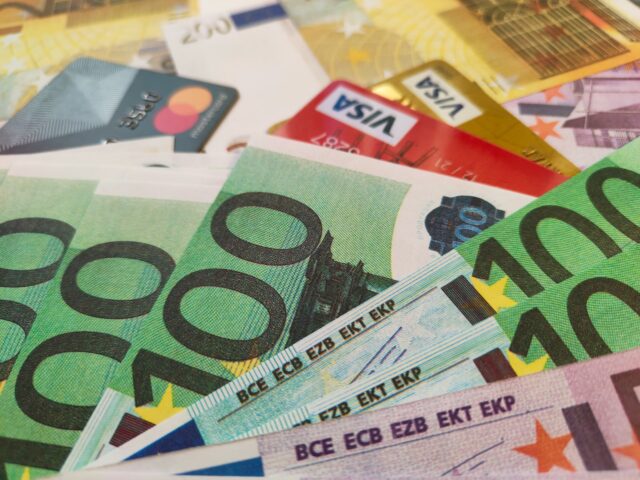 Photo by Vardan Papikyan a pile of different types of euro bills
