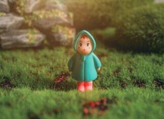 How to Create Stunning 2D Art for Your Games with Whimsy Games red haired girl in green dress figurine on green grass during daytime