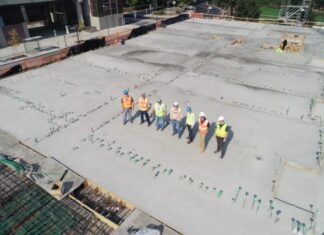 How to Improve Safety for Job Site Visitors seven people standing on rooftop