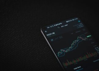 The Role of Stablecoins in the Cryptocurrency Market black android smartphone on black textile