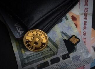 Analyzing the Relationship Between Bitcoin Price and Mining Difficulty a bitcoin sitting on top of a pile of money