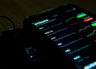 smartphone on brown wooden surface