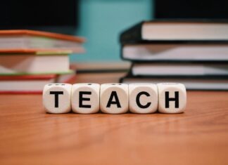 10 Ways an Advanced Degree Can Improve Your Teaching Skills A stack of books and dice spelling the word teach Description automatically generated
