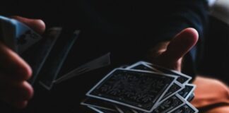 person playing with cards