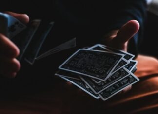 person playing with cards