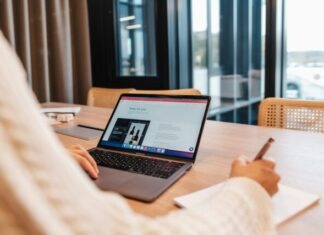 E-commerce Strategies: Winning in the Online Marketplace a person sitting at a table with a laptop