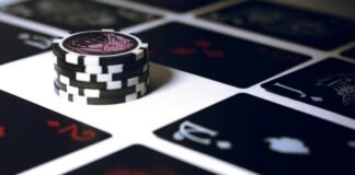 poker chip on white surface