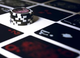 poker chip on white surface