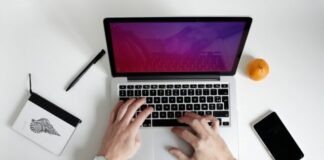 person using laptop computer