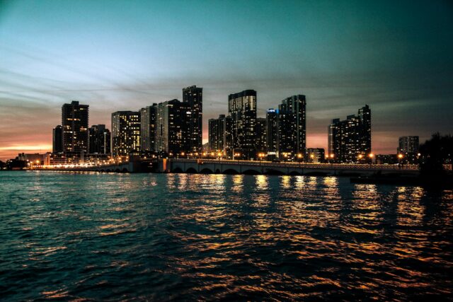 Photo by Jose Garcia city lights buildings at night