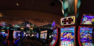 a casino room filled with lots of slot machines
