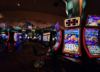 a casino room filled with lots of slot machines