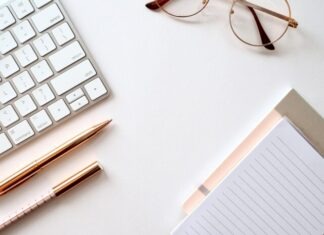 Streamlining Operations in Retail Management pen near black lined paper and eyeglasses