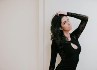 The Entrepreneurial Spirit in Escorting: Building a Brand and Marketing Your Services woman wearing black long-sleeved dress