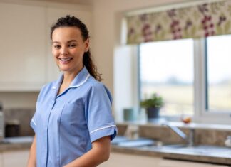 The Bright Future Of Social Work A person in a blue uniform Description automatically generated