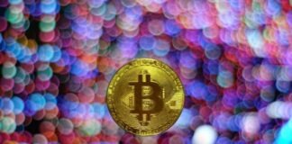 round gold-colored Bitcoin illustration