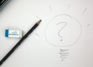 How to Design a Winning Business Model black pencil on white printerpaper