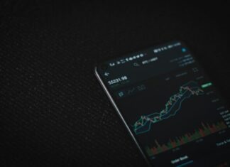 Stop Sabotaging Yourself: Trade Like a Pro with These Expert Strategies black android smartphone on black textile