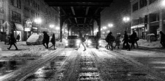 grayscale photo of people walking on street