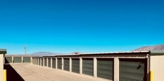 a row of storage units in a parking lot