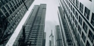 grayscale photo of high rise buildings