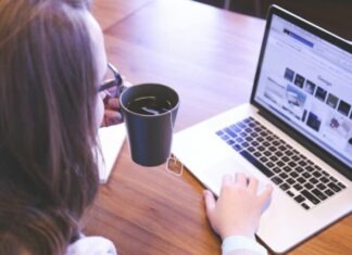Guide to Direct Order from Taobao woman holding tea filled mug using MacBook