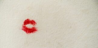 red stain on white wall
