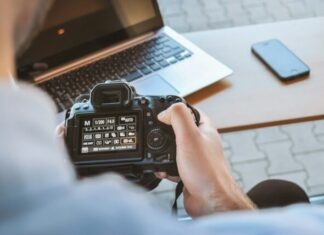 Navigating Your Options: A Guide to Choosing the Perfect Photography Certificate Course person holding black DSLR camera