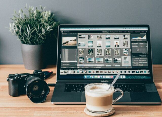 Photo by Mylene Tremoyet black laptop computer beside white ceramic mug on brown wooden table