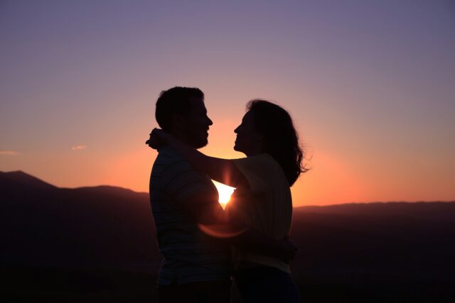 Photo by Oziel Gómez silhouette of hugging couple