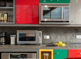 How To Fix Equipment and Appliances on Your Own silver microwave oven on black marble counter top