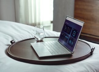 How Remote Access Security Works & Its Benefits? laptop on brown wooden table