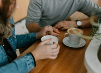 Secrets vs. Privacy in a Relationship two mugs with coffee on table