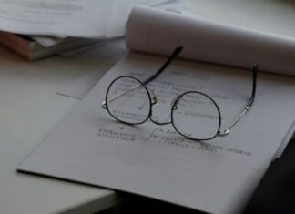 Career Changes: How To Switch to Psychology black framed eyeglasses on top of white printing paper