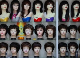 OHMYPretty The Rise of Ready-to-Go Glueless Lace Wigs: A Game Changer in Hair Fashion a display case filled with lots of mannequin heads